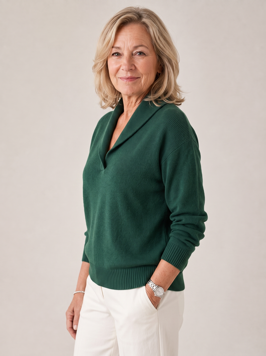 Side view of the Greta sweater in forest green showing the relaxed fit