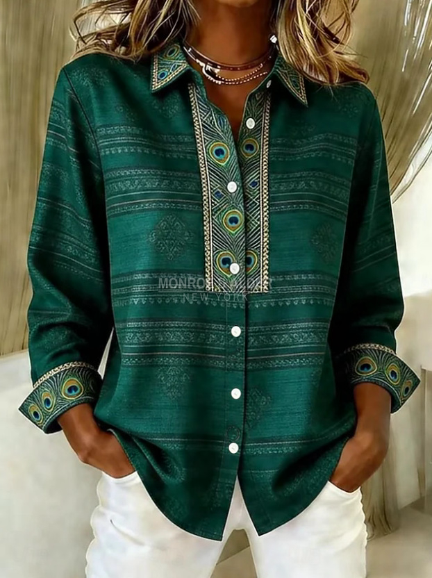 Ingrid dark green blouse with a folk-inspired print, front view