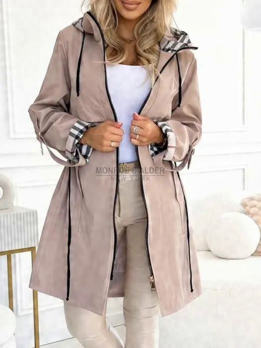 Odessa hooded zip jacket in beige, worn open with plaid cuffs