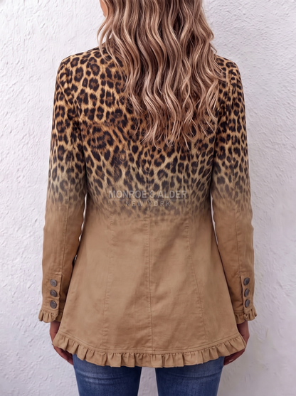Back view of the Vonda jacket in Tan Leopard, showing the leopard-to-tan gradient and the ruffled hem