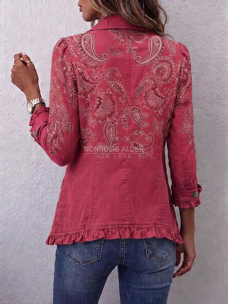 Antoinette jacket in Rose Pink, back view showing the print and ruffled hem