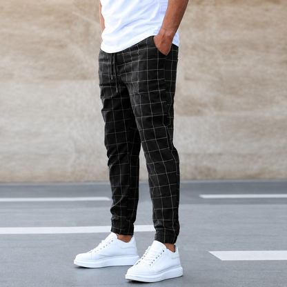 Hayes checkered jogger pants in black, side view