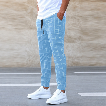 Hayes checkered jogger pants in light blue, showing the drawstring waist and tapered ankle cuffs