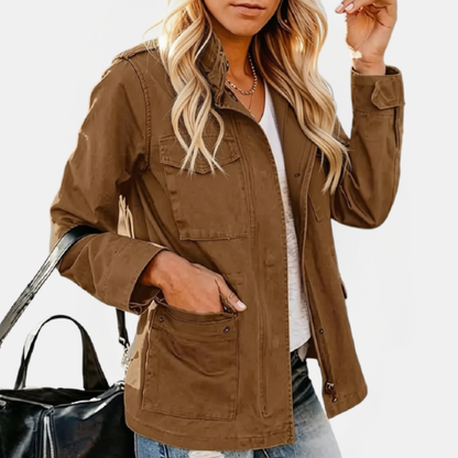 Verna jacket in brown with a hand in the lower cargo pocket