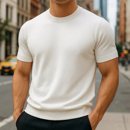 Warren fine knit t-shirt in white, worn on a city street