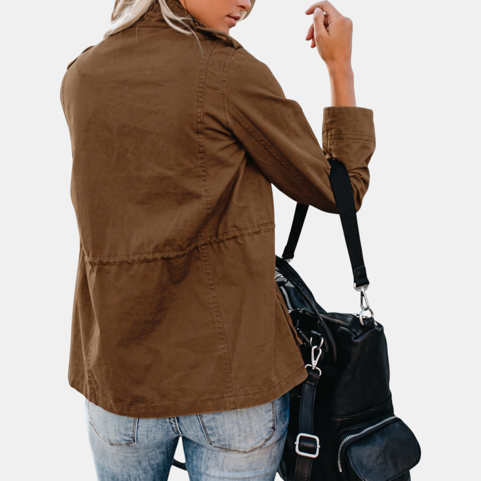 Back view of the Verna jacket in brown worn over jeans