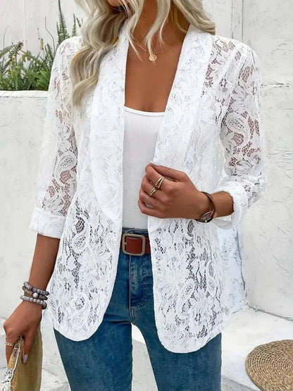 Lucy sheer lace blazer in white, worn open over a white tank top and blue jeans