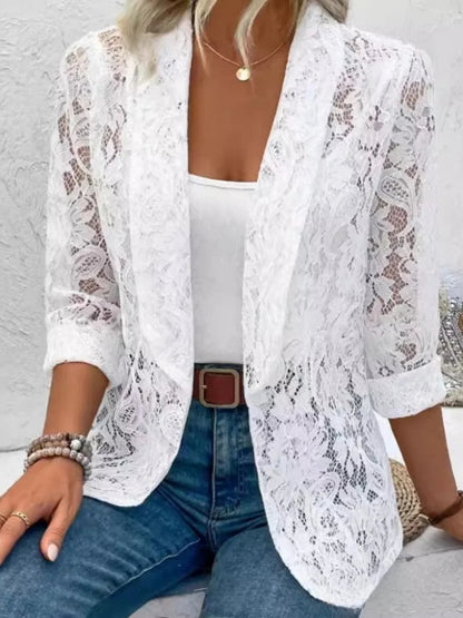 Close view of the floral lace and lapel collar on the white Lucy blazer
