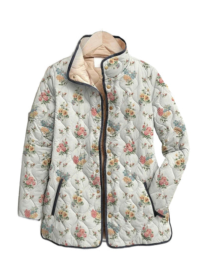 Daphne quilted jacket in a small-scale cream floral print, front view