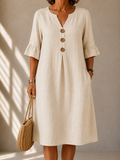 Geraldine™ — Beige Box Pleat Midi