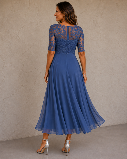 Elaine chiffon dress in Dusty Blue, back view showing the lace bodice and zip