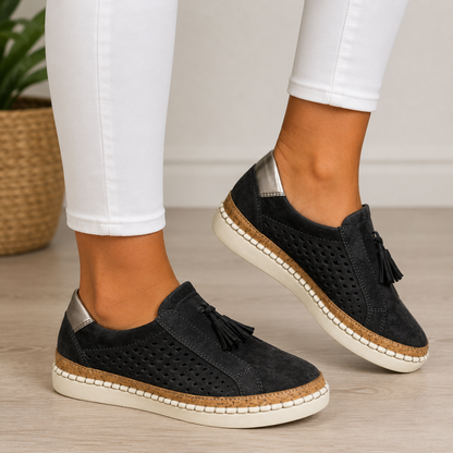 Norma cushioned slip-on loafers in Black, worn with cropped white jeans