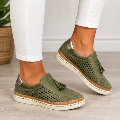Norma cushioned slip-on loafers in Olive Green, worn with cropped white jeans