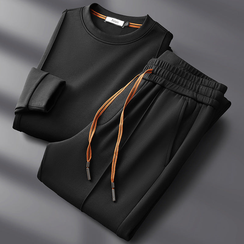 Wade cotton-silk set in black, sweatshirt and pants folded flat