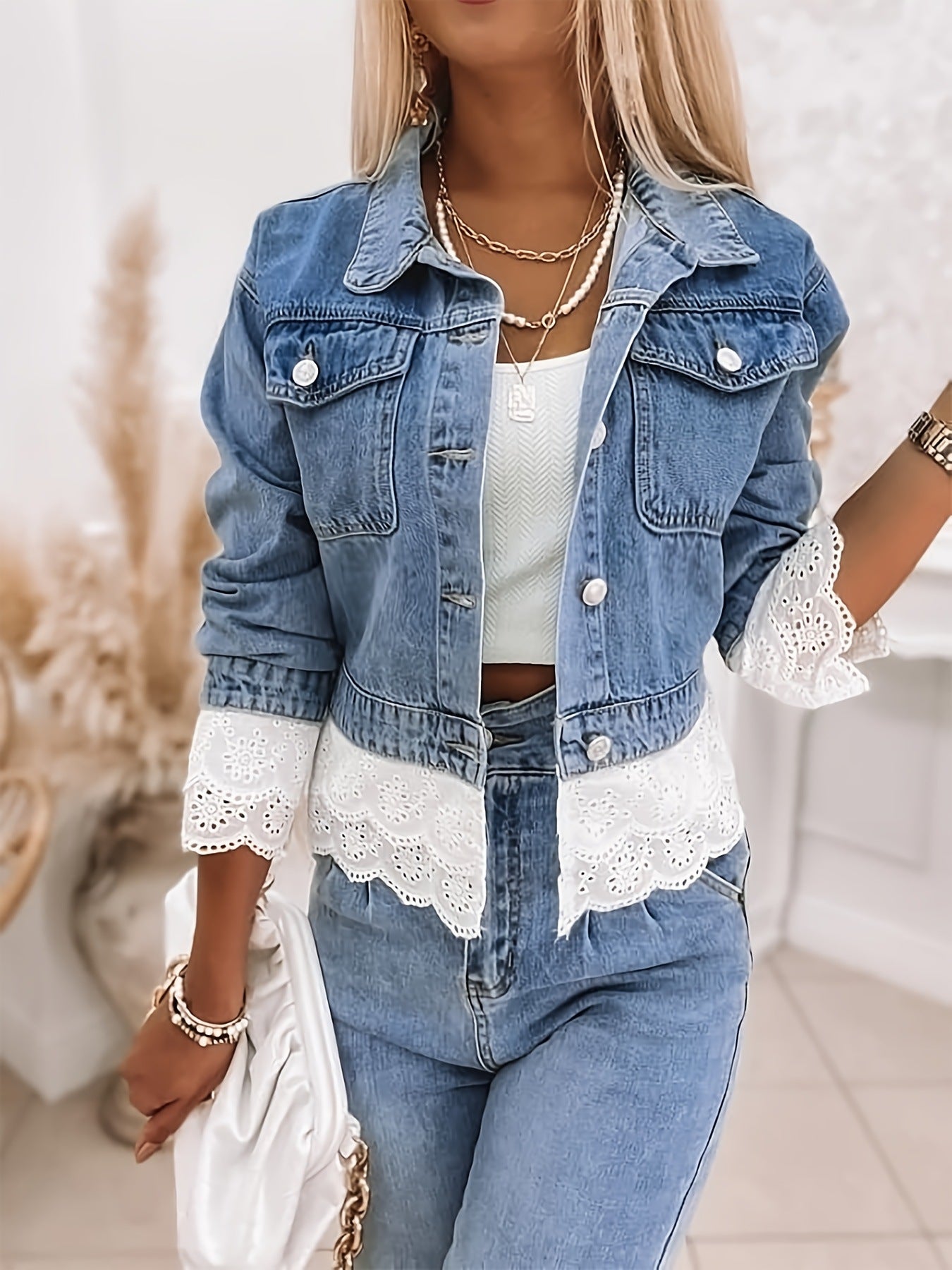 Winnie cropped denim jacket front view, lace hem falling below the denim waistband