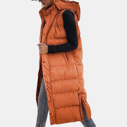 Thelma quilted hooded maxi vest in burnt orange, side view
