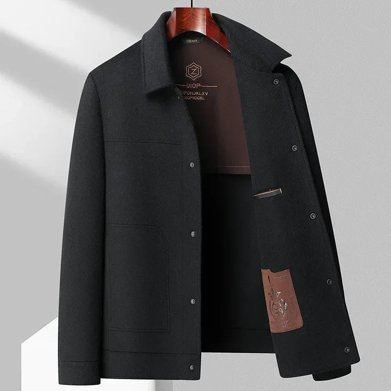 Flynn double-faced wool jacket in black, front view on hanger