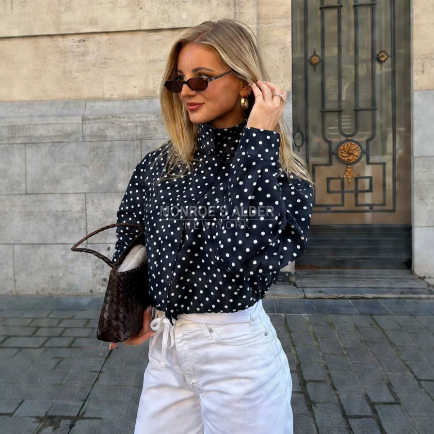 Edna polka dot jacket in navy worn with white jeans