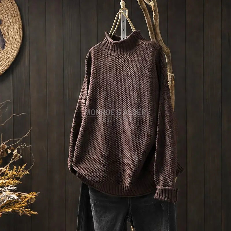 Esther sweater in brown on a hanger