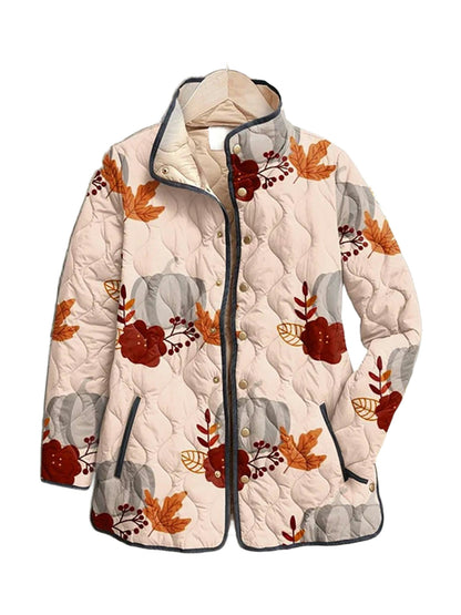 Nell quilted jacket in a blush harvest print with pumpkins and leaves, front view