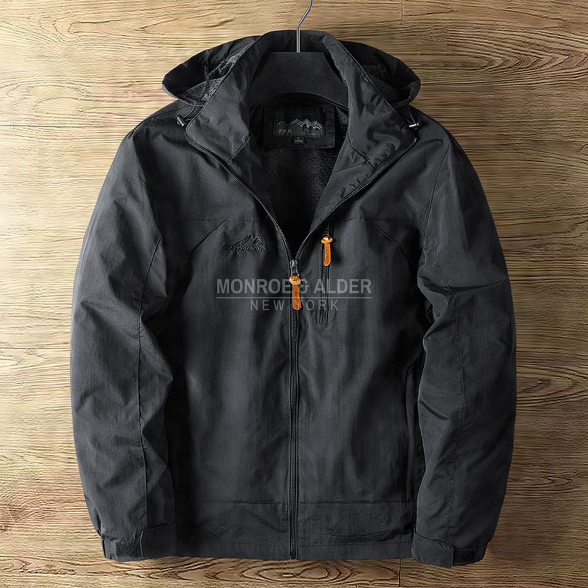 Garrett hooded jacket in black, front view on a hanger