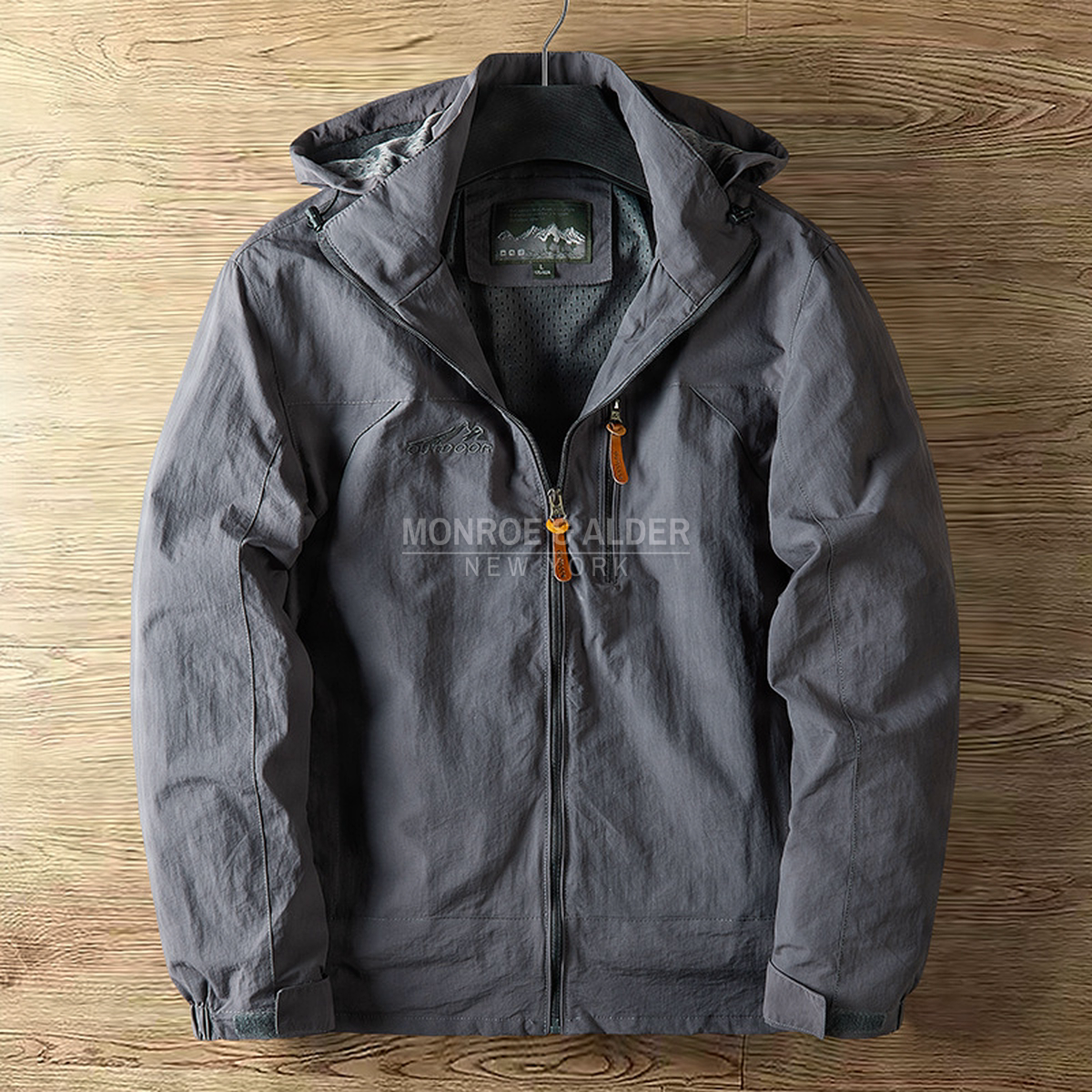 Garrett hooded jacket in charcoal, front view on a hanger