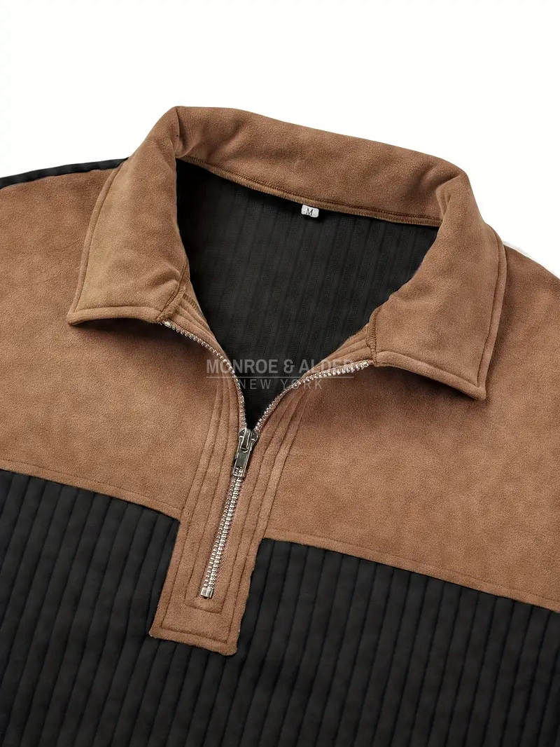 Close view of the suede-look polo collar and half-zip