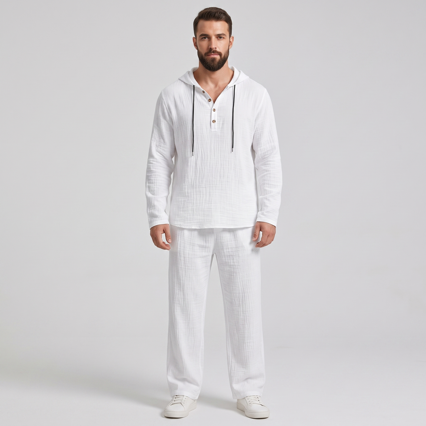 Man wearing the Everett white crinkle hooded henley and matching wide-leg pants, front view