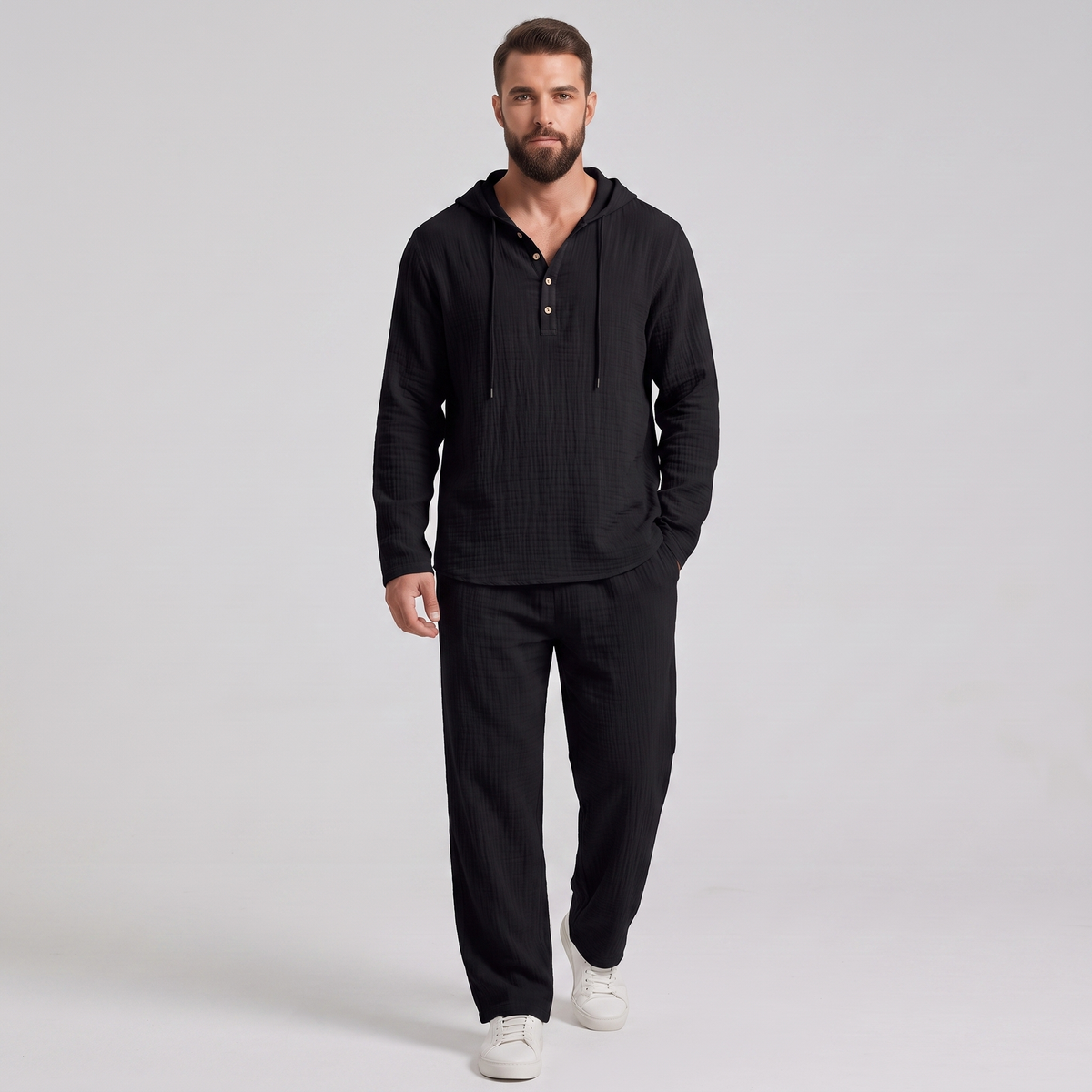 Everett crinkle hooded henley set in black, front view