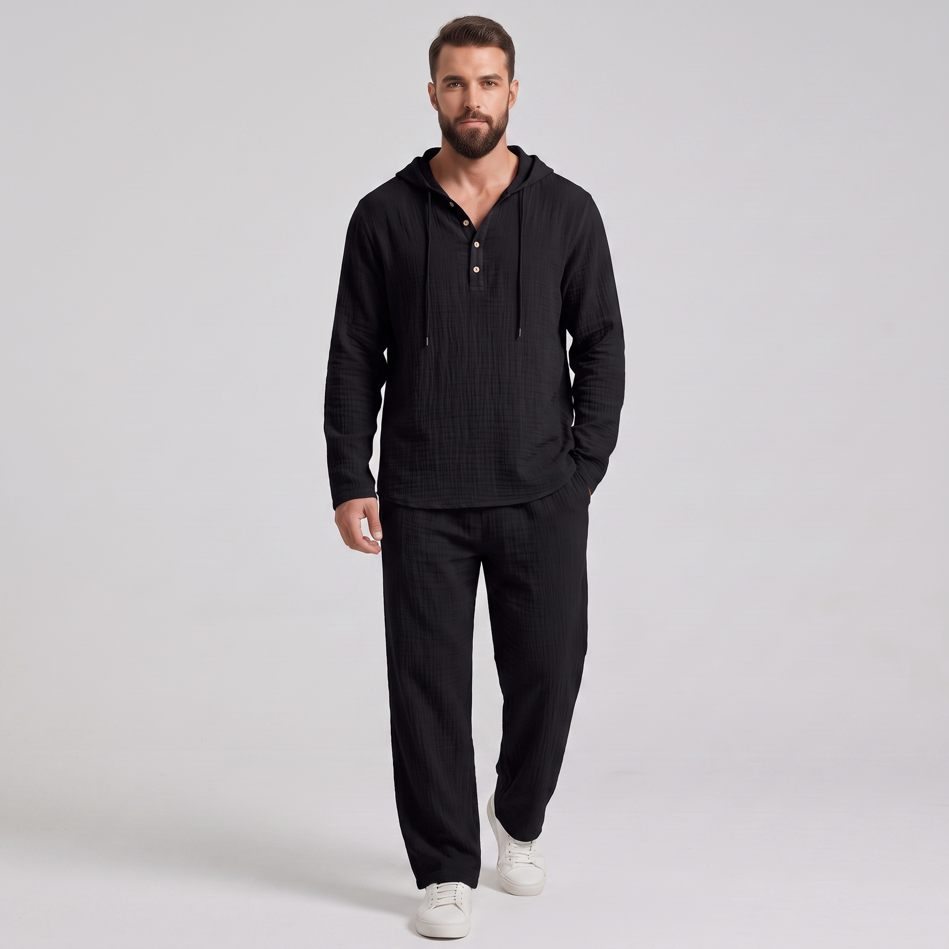 Everett crinkle hooded henley set in black, front view