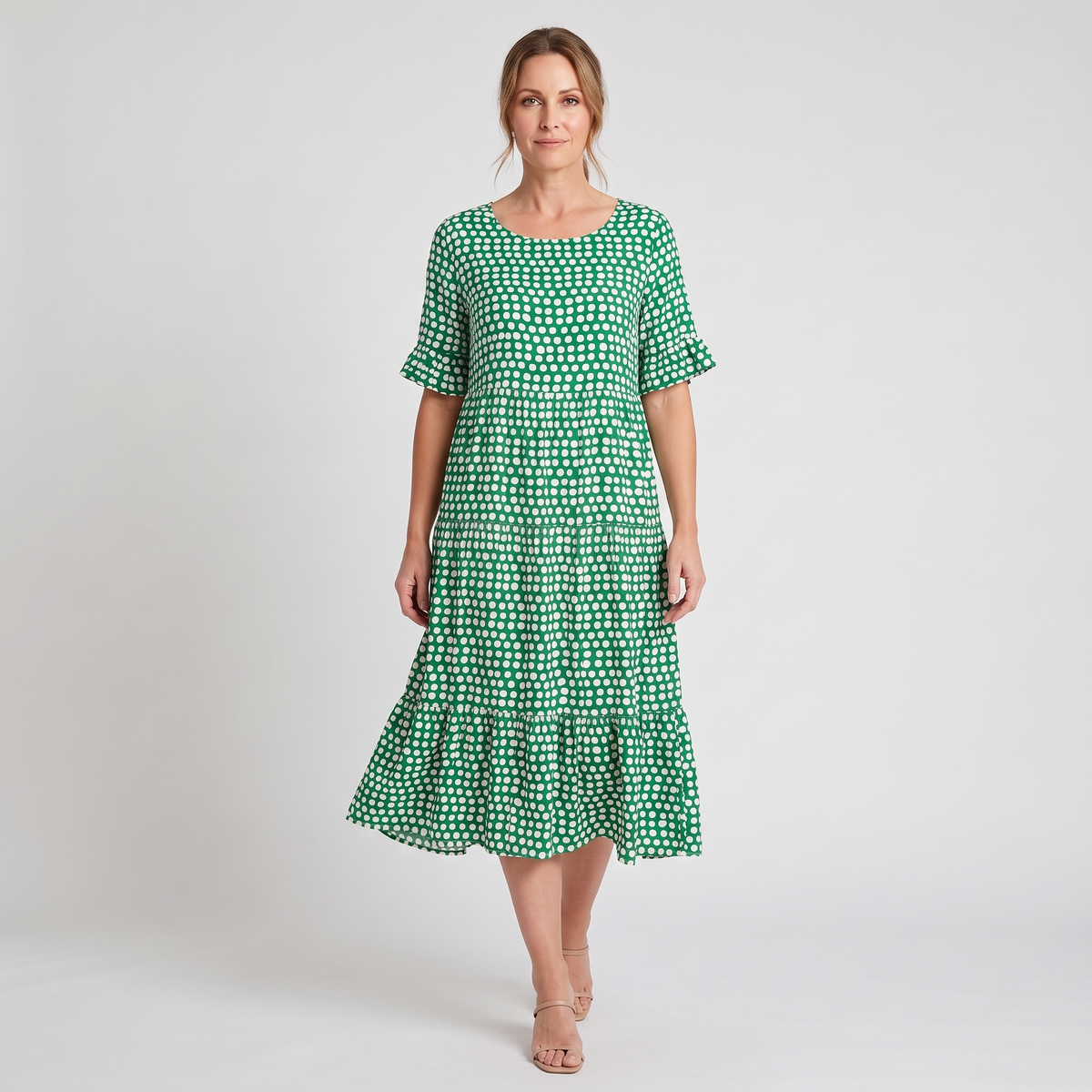 Sutton short-sleeve polka dot midi dress in green, walking
