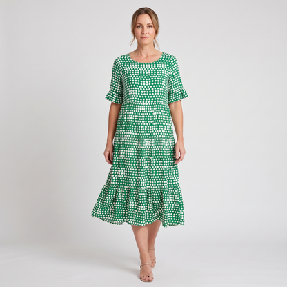 Sutton short-sleeve polka dot midi dress in green, walking