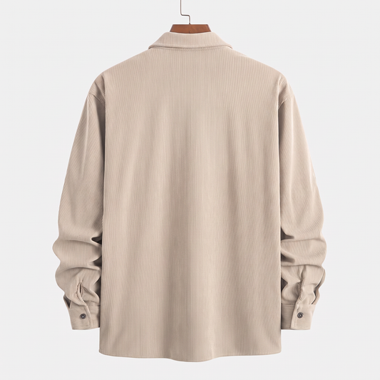 Back view of the Brooks beige corduroy overshirt on a hanger against a white background