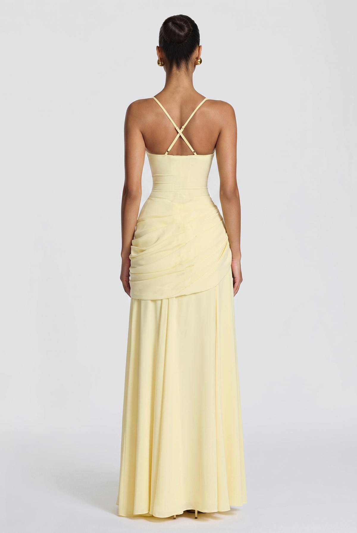 Genevieve maxi dress in butter yellow, back view showing the crossed adjustable straps