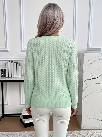 Back view of the Evelyn cozy cable knit sweater in mint green