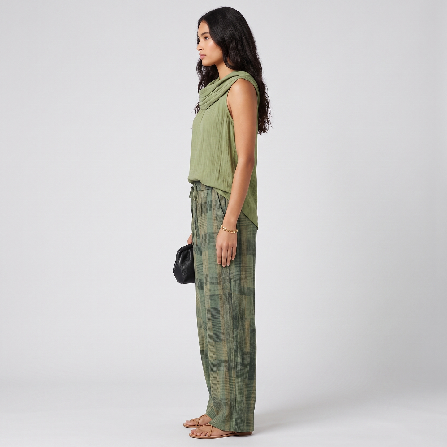 Side profile of the Iris set showing the drape of the top and the wide trouser leg