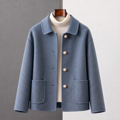 Myrna cashmere crop coat in Dusty Blue on a hanger, front view