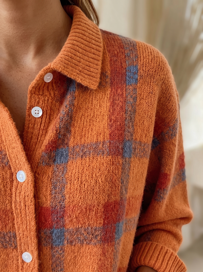 Close view of the collar, buttons and ribbed cuff on the Sadie plaid cardigan