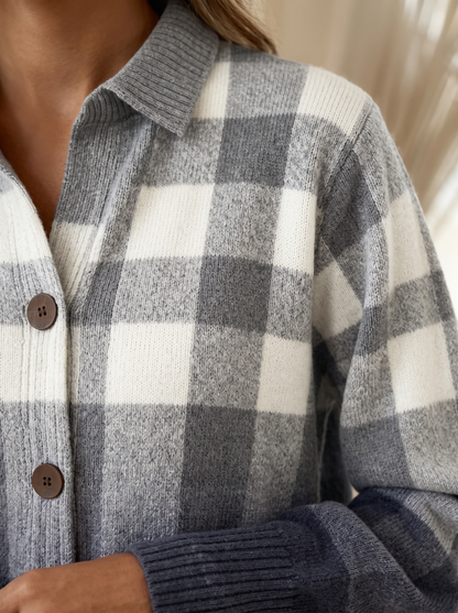 Close view of the collar, brown buttons and ribbed cuff on the Gladys plaid cardigan