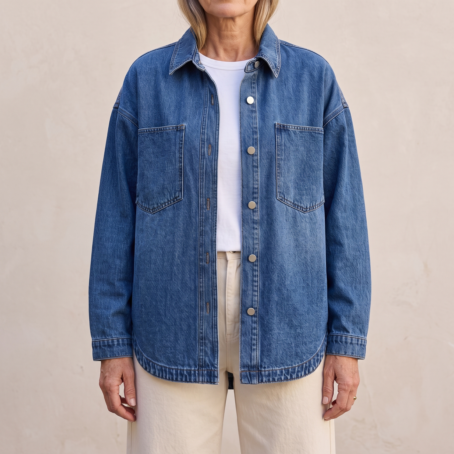 Bess oversized washed denim jacket in Blue, worn open over a white top