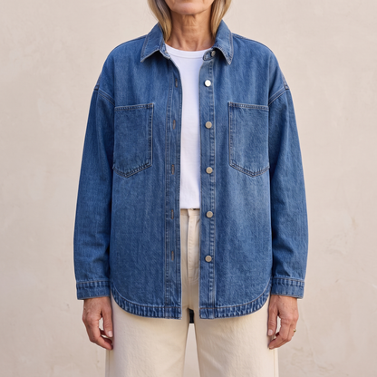 Bess oversized washed denim jacket in Blue, worn open over a white top