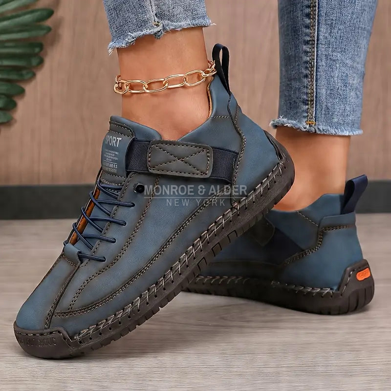 Lena comfort sneaker in Slate Blue with hand-stitched dark sole