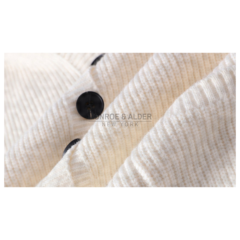 Ribbed knit and contrasting buttons on the Lowell cardigan in Ivory
