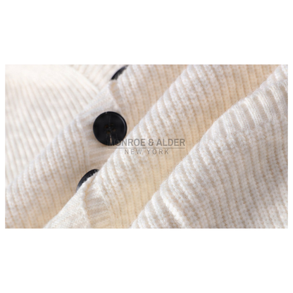 Ribbed knit and contrasting buttons on the Lowell cardigan in Ivory