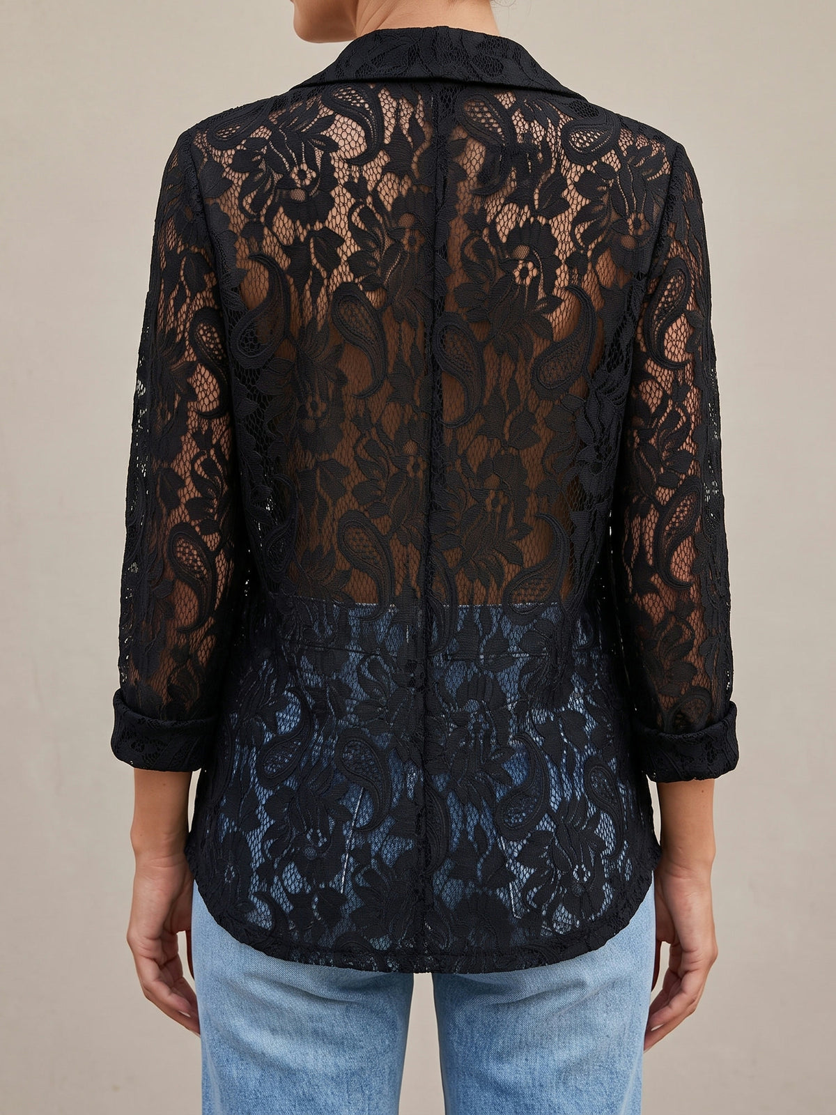Back of the black Lucy lace blazer showing the semi-sheer lace back panel