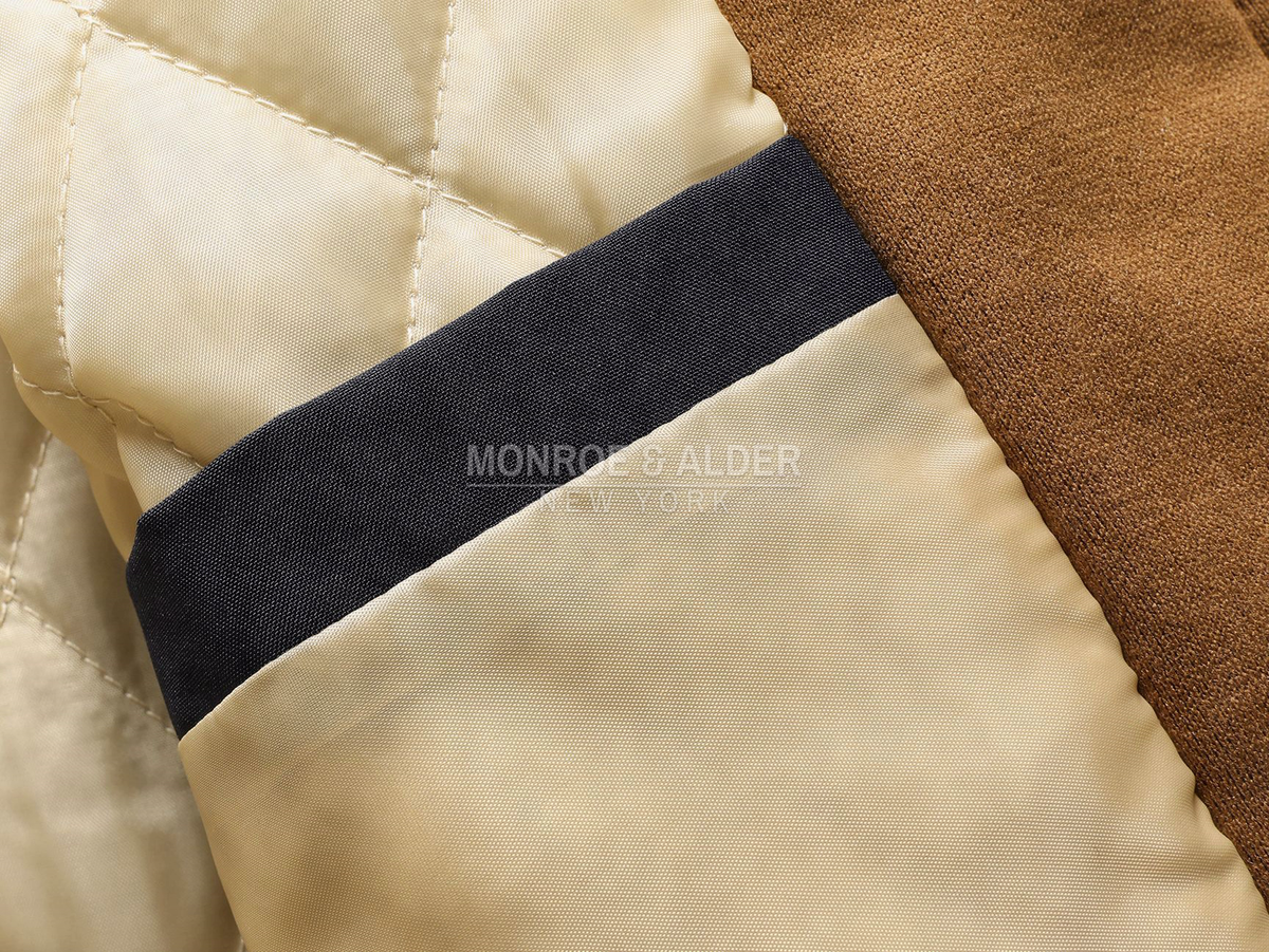 Close view of the quilted lining and inner pocket