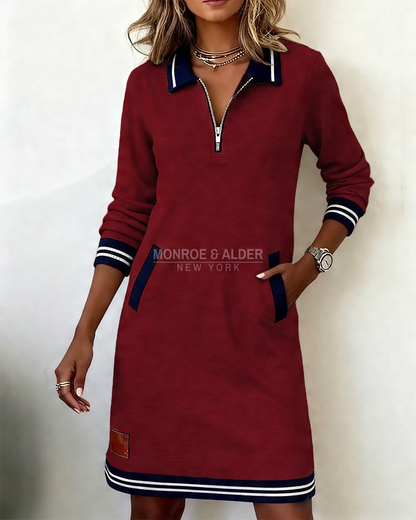 Marietta zip dress in burgundy with hand in side pocket