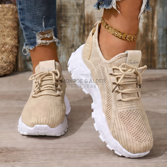 Molly supportive comfort sneaker in beige, worn with cropped jeans