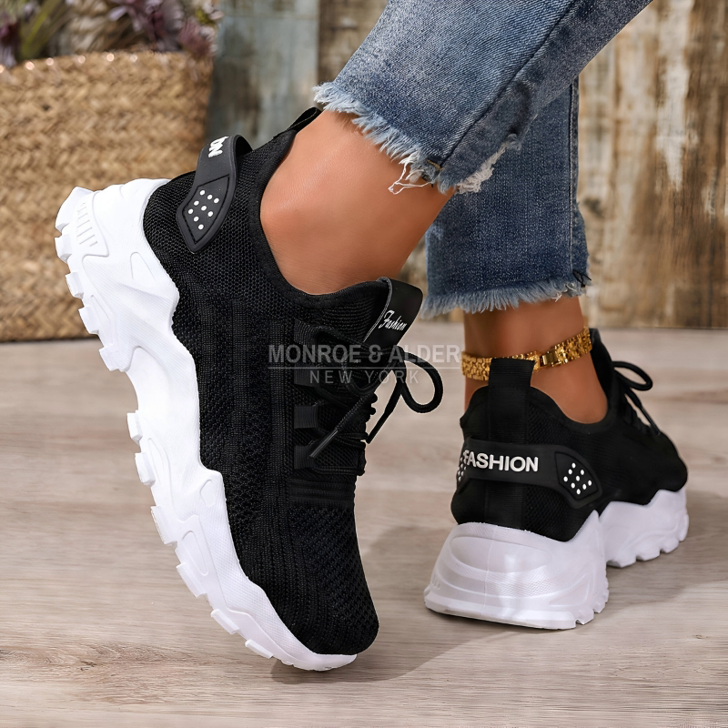 Molly sneaker in black, front and side view