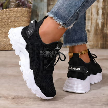 Molly sneaker in black, front and side view